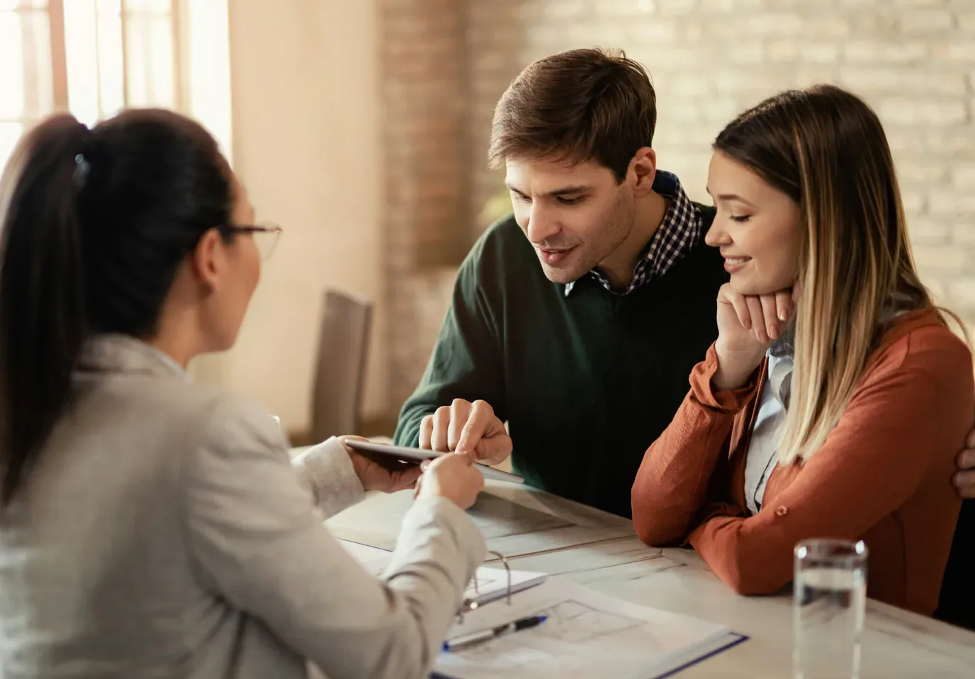 Couple reviewing retirement tax planning documents together