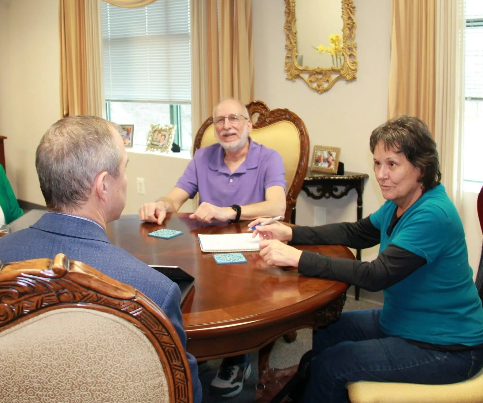 Adviser meeting with clients about Social Security retirement planning